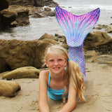 mermaid tail on the beach in Aurora Borealis