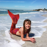 Tiger queen mermaid tail on beach